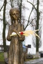 Sculpture of hungry young girl with ears of wheat in her hands. Kiev, Ukraine Royalty Free Stock Photo