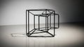 Sculpture of a hypercube or tesseract is displayed on a flat Royalty Free Stock Photo