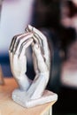 Sculpture of intertwined hands in decoration