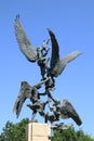 Sculpture of Jacob`s ladder atop a pillar with background of blue sky