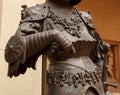 Sculpture of King Arthur old metal statue. Medieval knights armor full size standing warrior. Order of the Knights Royalty Free Stock Photo