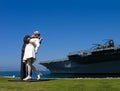 Sculpture of kissing seaman and girl