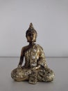 Sculpture of Kwan Yin with neutral background Royalty Free Stock Photo