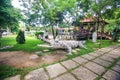 Sculpture of Large Crocodile on Grass in Park