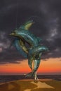 Sculpture of leaping dolphins, Puerto Vallarta Royalty Free Stock Photo