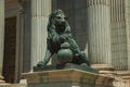 Sculpture lion cast in bronze on building facade in Madrid