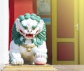 Sculpture of a lion guarding the entrance to the Buddhist temple of the Syakyusn sume