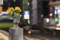 Sculpture of a little boy Manneken pee peeing and holding sunflower flowers on the quay of hamamatsucho station in Tokyo, Japan.