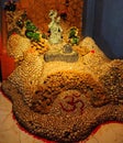 Sculpture of lord Krishna and Radha on stones.