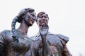 Sculpture of lovers called My Happiness, art object on white background. Waist up portrait, view from below. Astana Nur-Sultan,