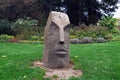 Sculpture made from Egyptian basalt by artist Knut HÃÂ¼neke called `Head` resembling moai statues standing in Weinheim