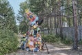 Sculpture made out of waste material on rural way as part of art exhibit and environmental movement