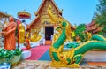 The sculpture of Makara crocodile disgorging Naga serpent at Wat Phra Singh, Chiang Rai, Thailand