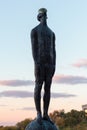 Sculpture of a man with a drop on his head over the cities of Kiev Royalty Free Stock Photo