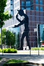 Sculpture of a man working in the center of Frankfurt`s business district