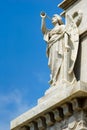 Sculpture of a marble angel playing the flute Royalty Free Stock Photo