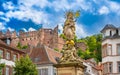 Sculpture of the Marien fountain on corn market Kornmarkt, old castle of Heidelberg in the background_Heidelberg, Baden
