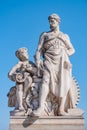 Sculpture of mechanic and his scholar on Zoll Bridge in Magdebur