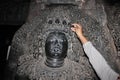 Sculpture with micro carved hallow skull at Hoysaleswara Temple
