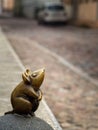 Sculpture of the Mouse with large ears sculptors S.Plotnikov and S.Yurkus performing desires on the cobbled street of the Old