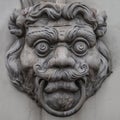 Sculpture of mysterious ancient creature in downtown of Potsdam, Germany, portrait, details