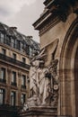 Sculpture near Opera National de Paris Garnier Palace,1875 .Paris Opera - famous neo-baroque building, UNESCO World Royalty Free Stock Photo