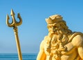 Sculpture Neptune against the sea