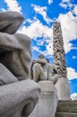 Sculpture obelisk and other male statues in Vigeland Park, Oslo