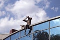 Sculpture Observer on the roof of contemporary building, Kiev, Ukraine.