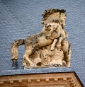 Sculpture of a pair of horses located on the edge of the roof, at the Hotel National des Invalides, Royalty Free Stock Photo