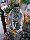 Sculpture with pearls and flowers deposited as an offering at the Pig Memorial. Bangkok Pig Monument