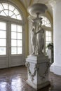 Sculpture of three standing women carrying a vase in the hall of Rund?le Palace