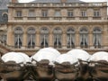 Sculpture with polished steel spheres displayed in the courtyard of the Louvre museum in Paris