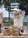 Sculpture of Portuguese fisher women in a roundabout in Portimao at the Algarve coast of Portugal