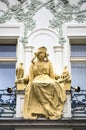 Sculpture of Princess Libuse on historinc building facade, Karlova, Prague, Czech Republic.