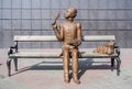 Sculpture of Pushkin sitting on the bench