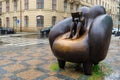 The sculpture Reader in an armchair is made in bronze. Tourist attractions. August 24, 2022 Prague Czech Republic