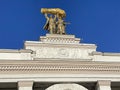 Moscow, Russia, February, 20, 2024. Sculpture on the roof of the arch of the main entrance of the VDNH Royalty Free Stock Photo