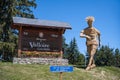 A sculpture of a runner made of straw at Col du Telegraphe mountain pass