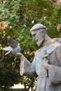 Sculpture of Saint Francis holding a dove and a cross Royalty Free Stock Photo