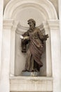 Sculpture saint Peter on wall catholic cathedral in old history town Lutsk.