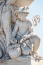 Sculpture of scientist with a book and his scholar on Zoll Bridge in Magdeburg downtown at direct light background, Germany,