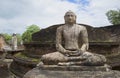 Sculpture of a seated Buddha at the ruins of the Vatadage. Polonnaruwa, Sri Lanka Royalty Free Stock Photo