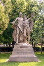 sculpture of slavic mythical figures - statues of Zaboj and Slavoj on pedestal in Vysehrad, Prague, Czech republic