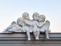 Sculpture of small angels with wings on the roof