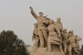 Sculpture of soldiers fighting at entrance to Mausoleum of Mao Zedong on Tiananmen Square in Beijing China