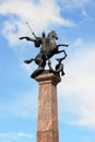 Sculpture of St. George on horseback, striking snake