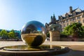 The sculpture stainless steel spheres and Sheffield Town Hall in Sheffield, UK