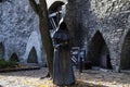 Sculpture and statue in Tallinn. The 3 monks of the Danish Garden. Estonia