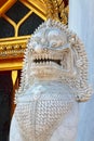 Sculpture of stone lions in front of the temple